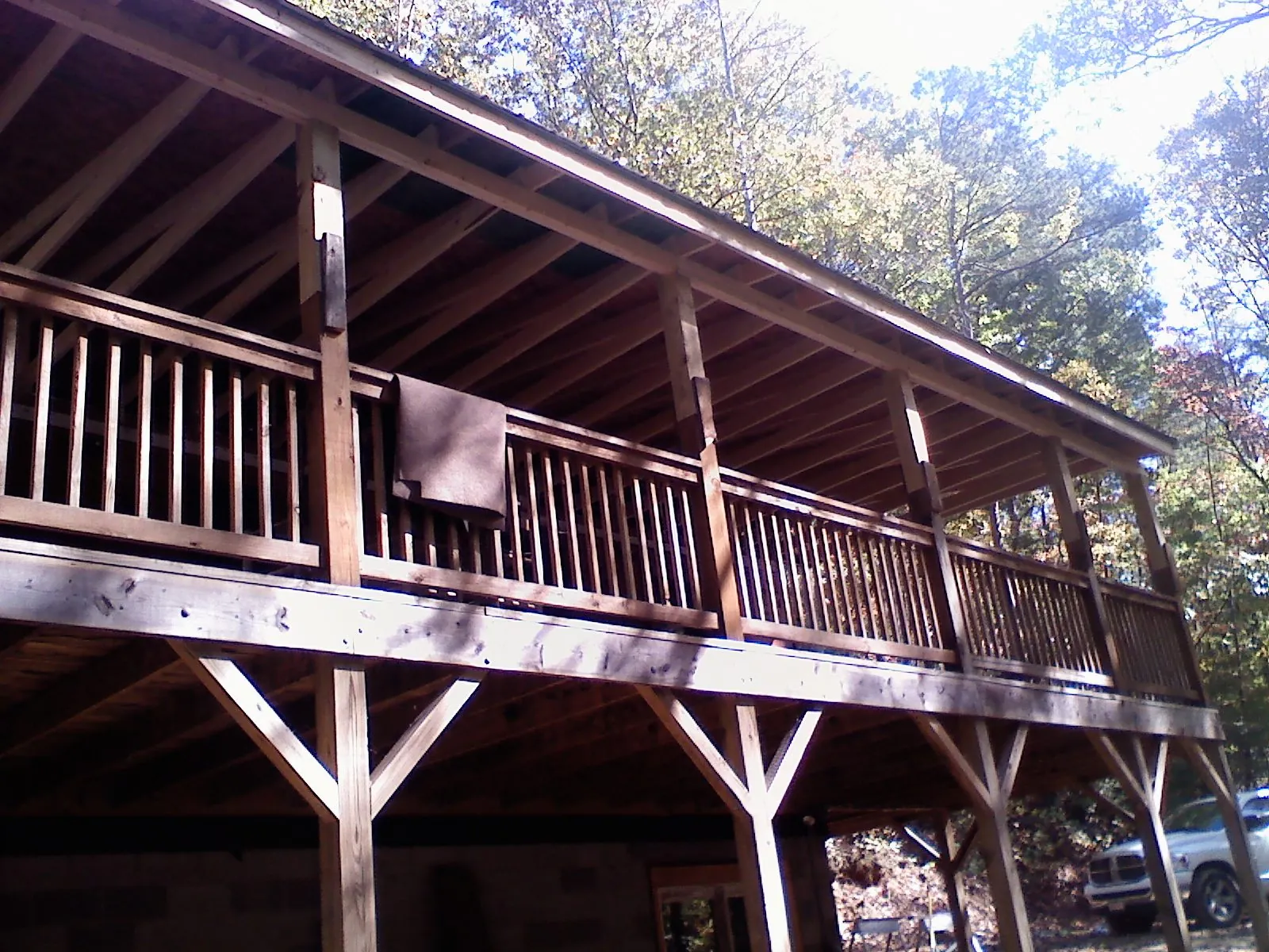 Timber framing under a new elevated porch and deck — Roof Leak Repair in Duxbury by Roofing Brothers